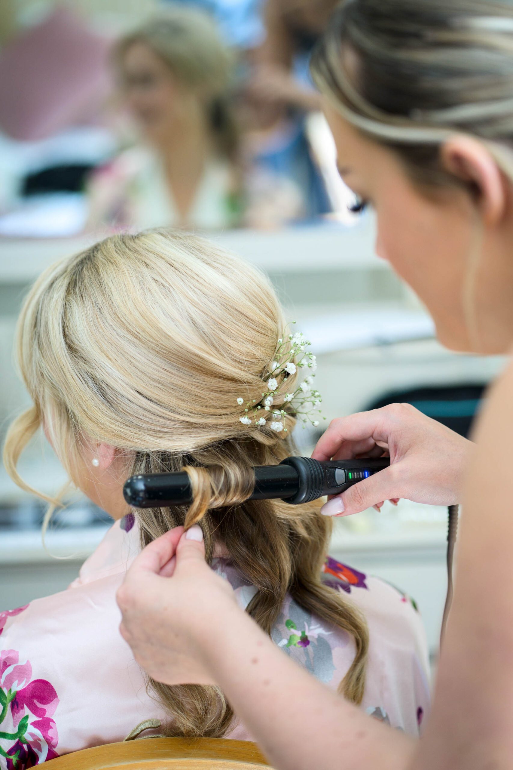 Hollie having her hair done for her wedding