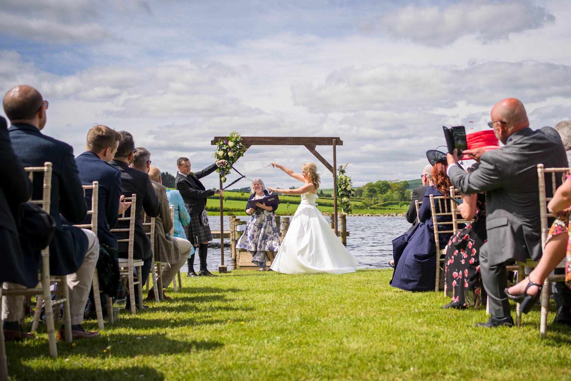 Hollie and Colin's traditional Scottish hand fasting during their wedding ceremony 