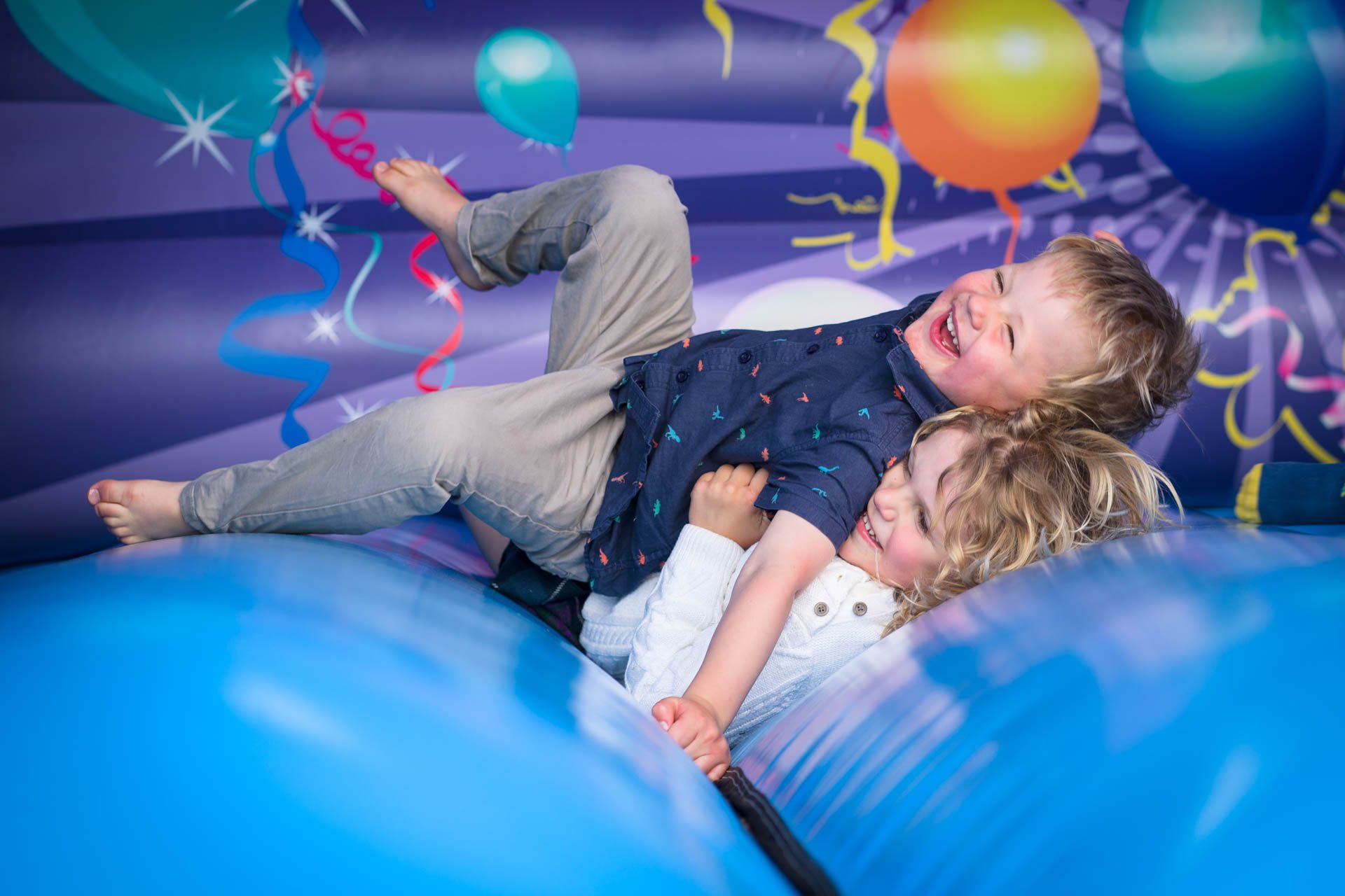 Bouncy castle for wedding guests both old and young!