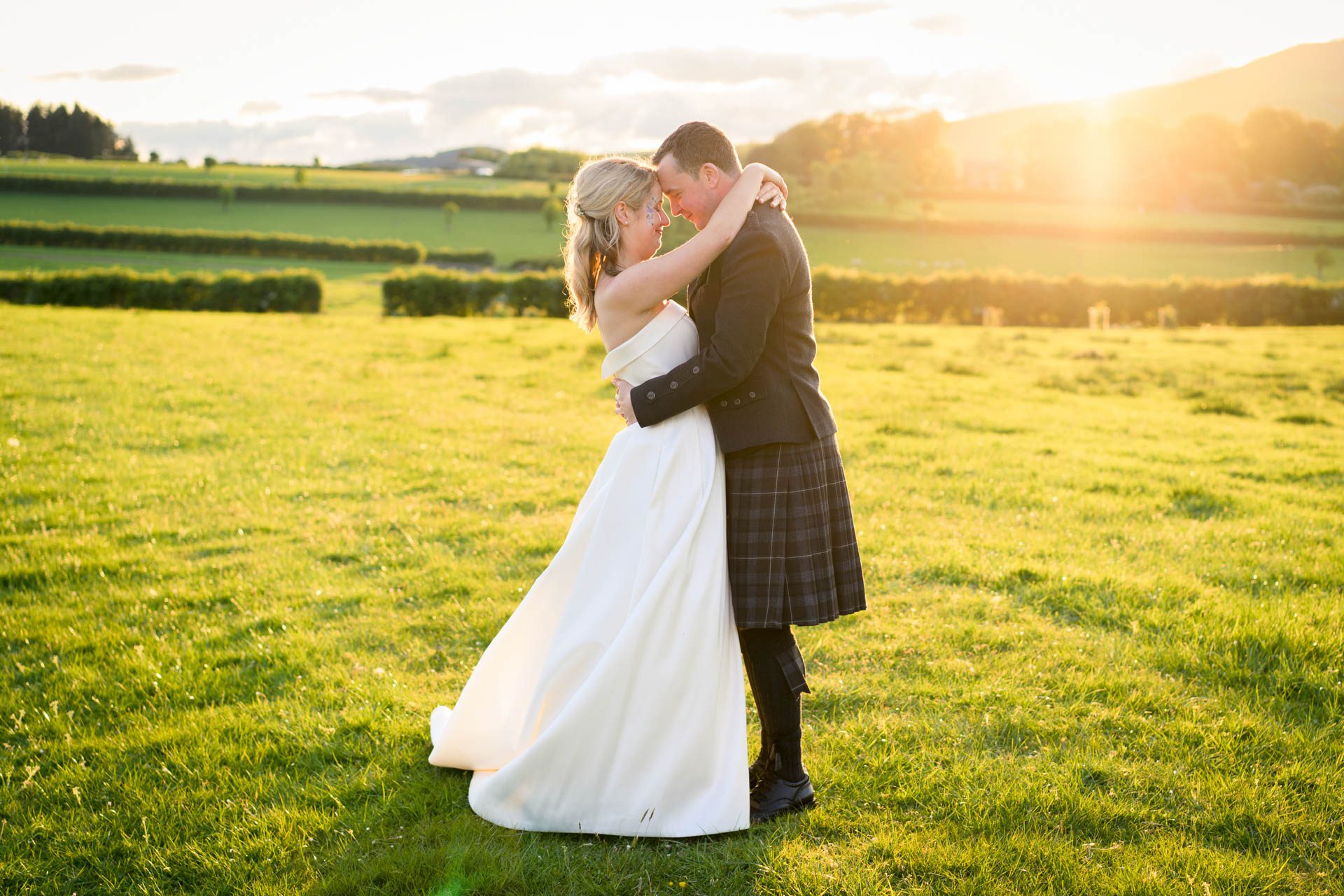 Golden hour wedding portrait of Hollie and Colin at their Scottish Borders wedding