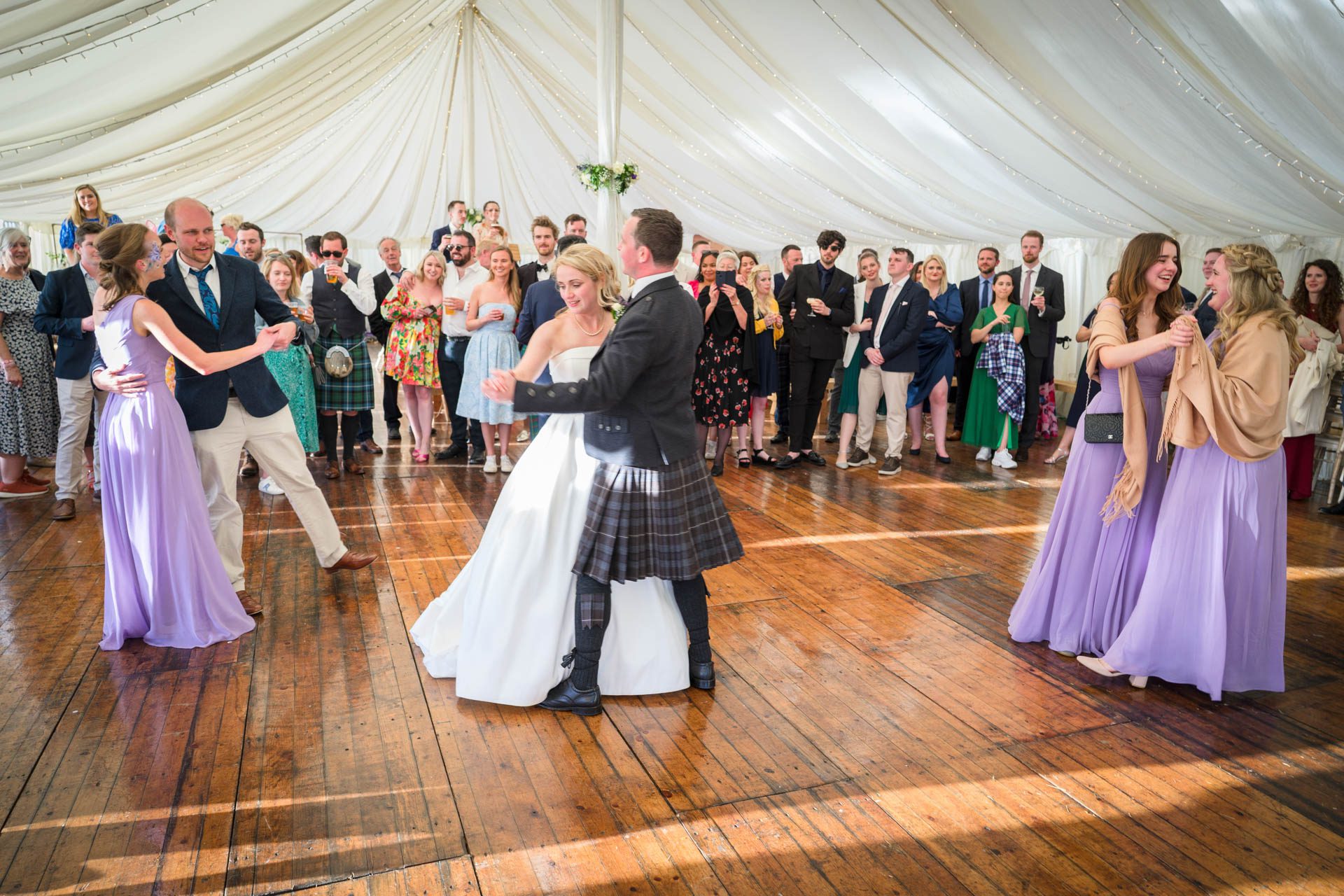 The bridesmaids joining Hollie and Colin's first dance