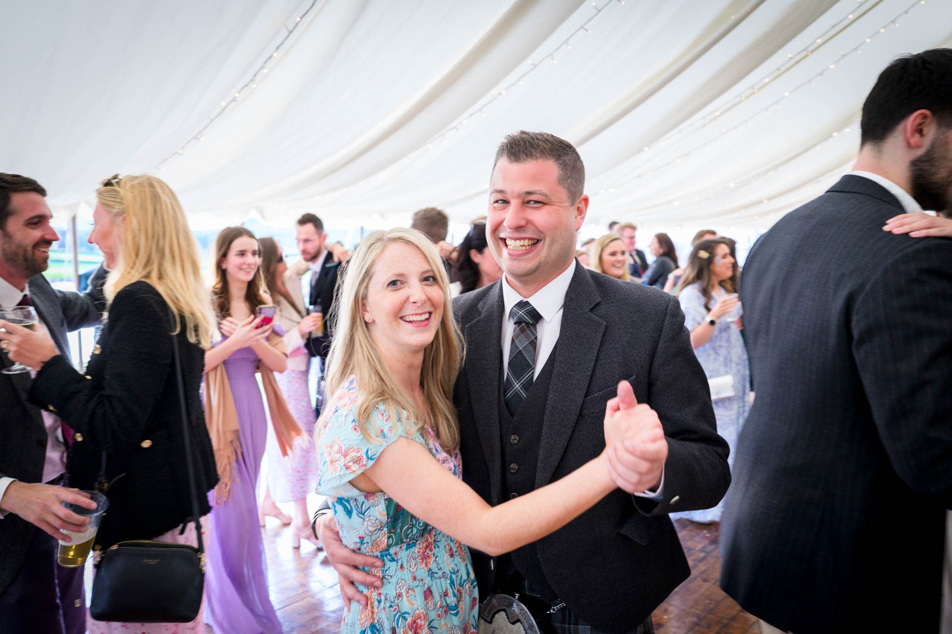 Wedding guests dancing