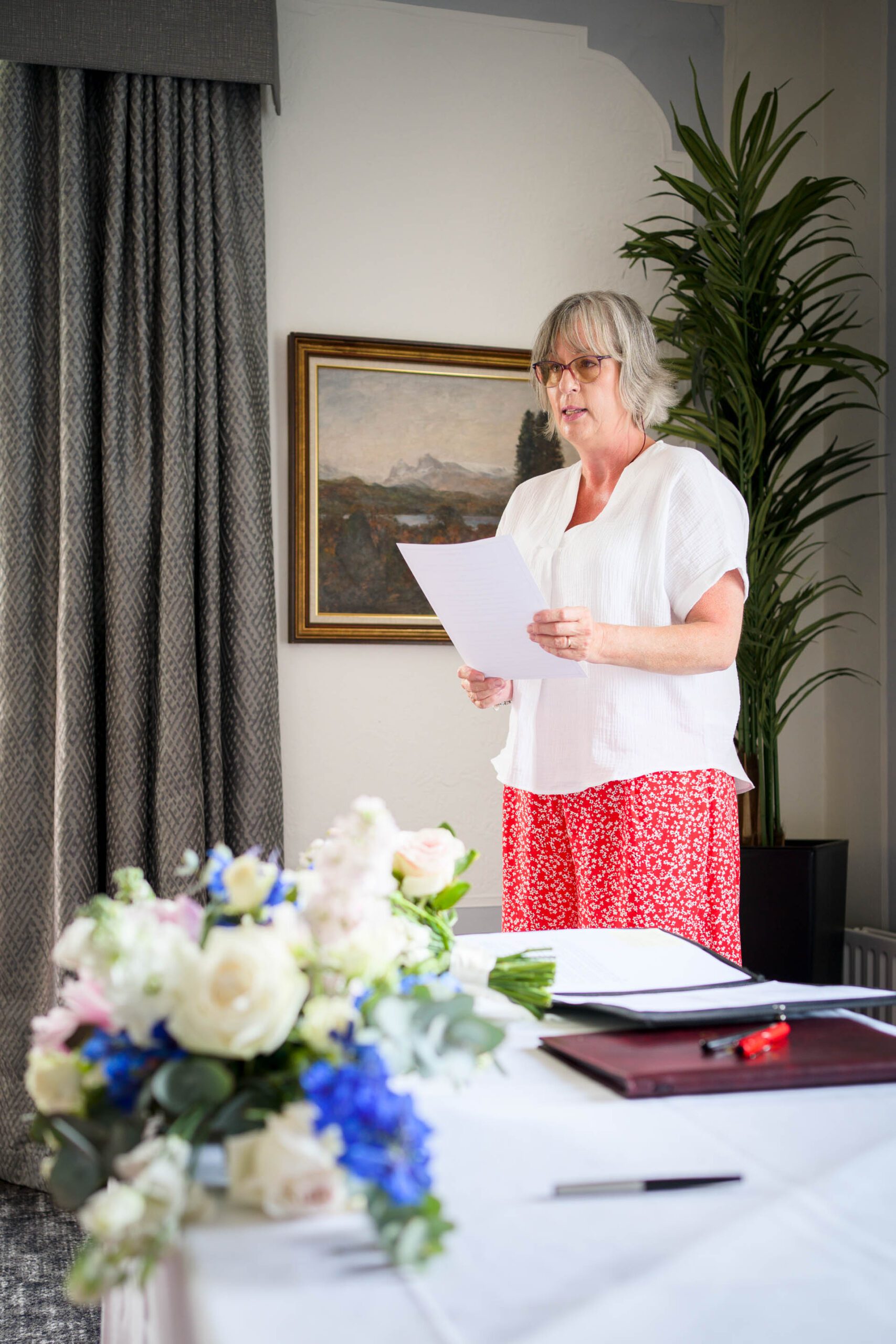 Guest making a reading during Low Wood Bay Resort Wedding